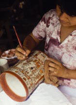 Mayan Fine Artist Patricia painting one of her creations displayed in our Toh Boutique at Chichen Itza, Yucatan, Mexico