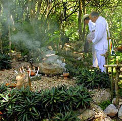 Mayan High Priest Ildefonso Ake Cocom celebrating a mystical Mayan Ceremony in Hacienda Chichen Sacred Ritual Site.